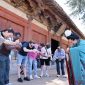 Guests on the “Discovering Shanxi’s Ancient Chinese Architecture” tour practice the Tang-style hand-over-chest salute at Foguang Temple in Xinzhou.